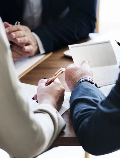 Business professional reviewing financial documents